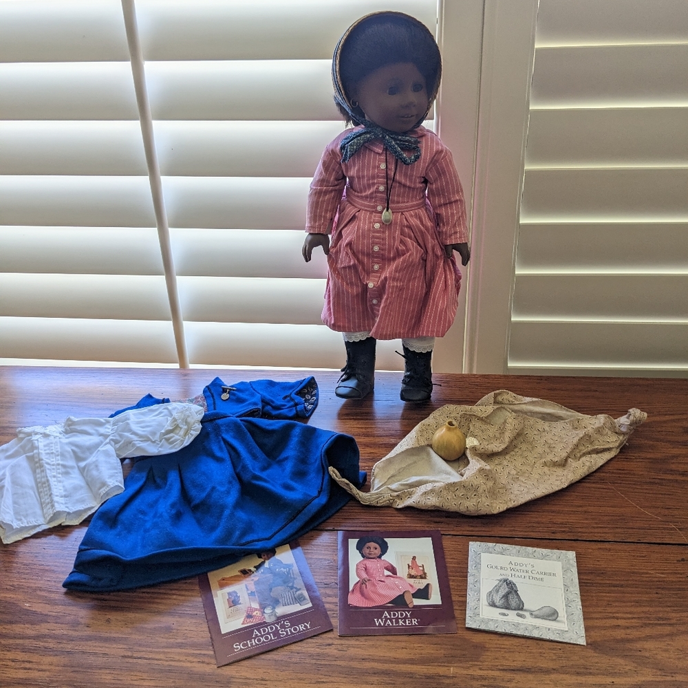 American Girl Doll Addy with accessories, outfits, and books